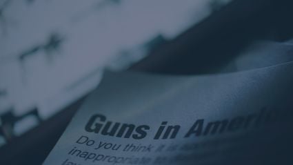 newspaper clipping of an article about guns in america