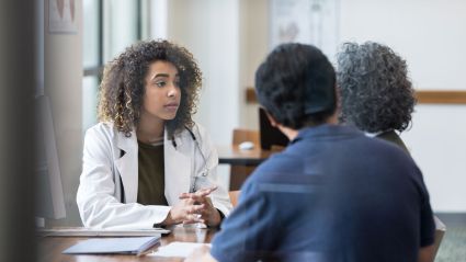 medical professional speaking to people