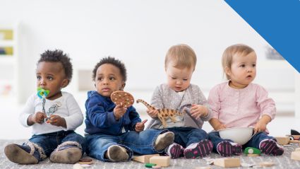 An image of four diverse babies leading to an article titled "The Economic Impact of Invest America Accounts".