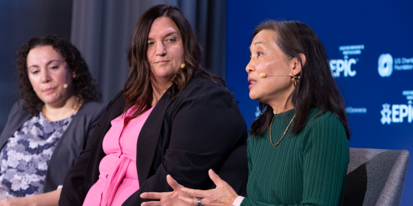 An image within a newsletter about the Future of Aging from the Milken Institute. There are three women sitting on a stage having a discussion and wearing business attire.