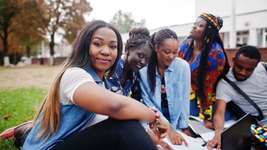 students on campus lawn