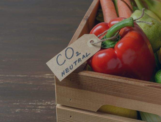 A wooden crate full of fresh produce