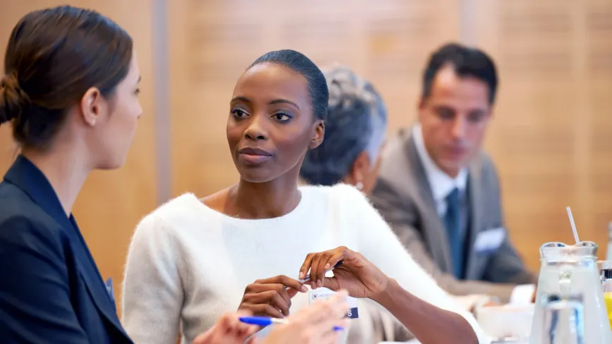 woman looking at another woman