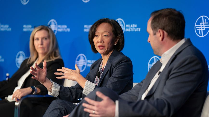 three people speaking on a public finance forum panel