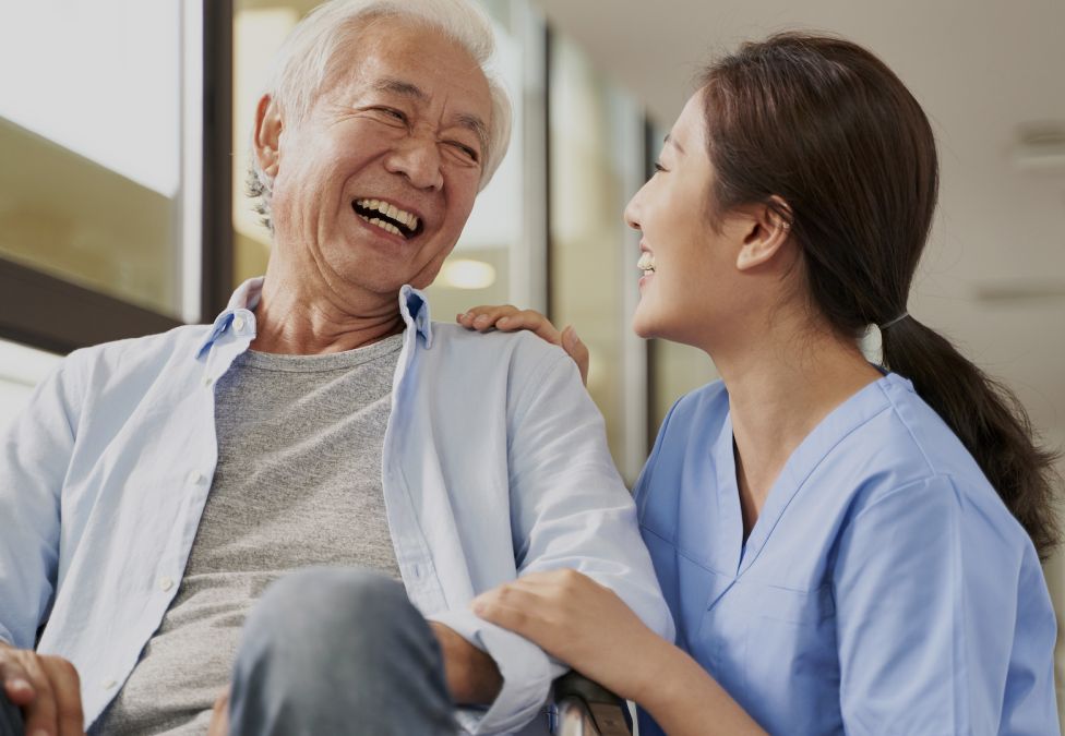 man and woman laughing