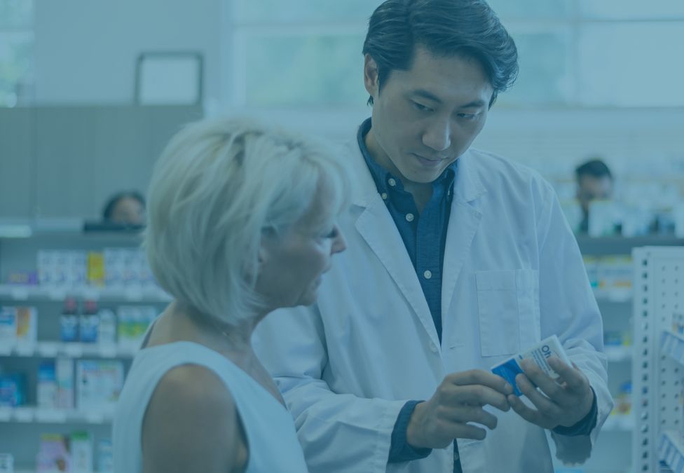 pharmacist talking to a woman